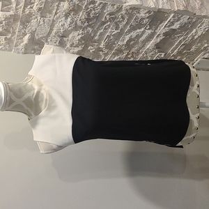 Zara Black and white sleeveless color blocking blouse with side zippers